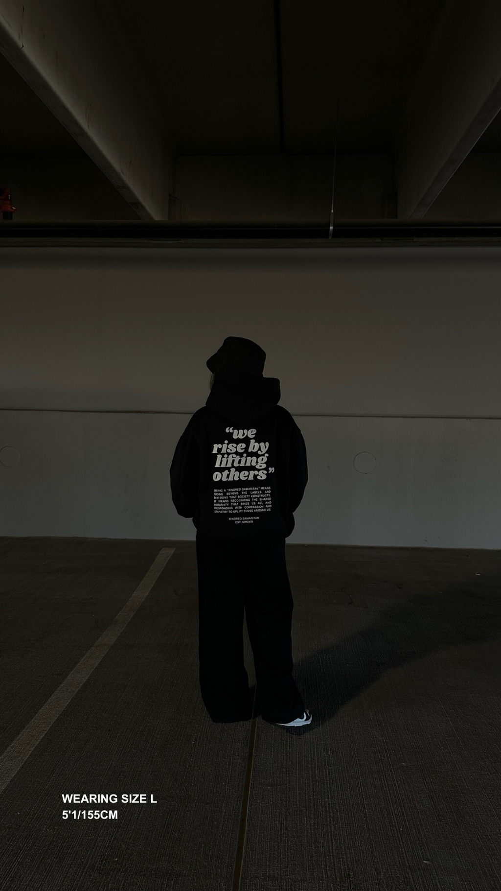 WE RISE BY LIFTING OTHERS HOODIE - BLACK